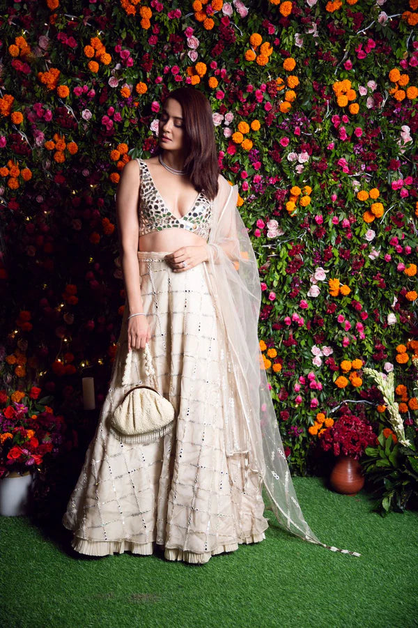 Behind The Glam Crafting Monika Nidhii’s Iconic Ivory Mirror Lehenga Worn By Surveen Chawla