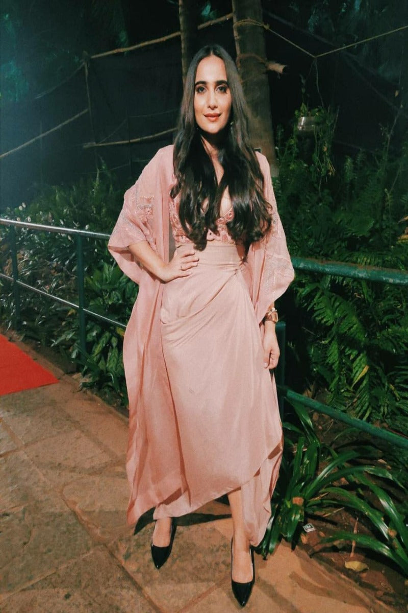 Kusha Kapila looks utlra-stylish in blush pink top with draped dhoti and cape