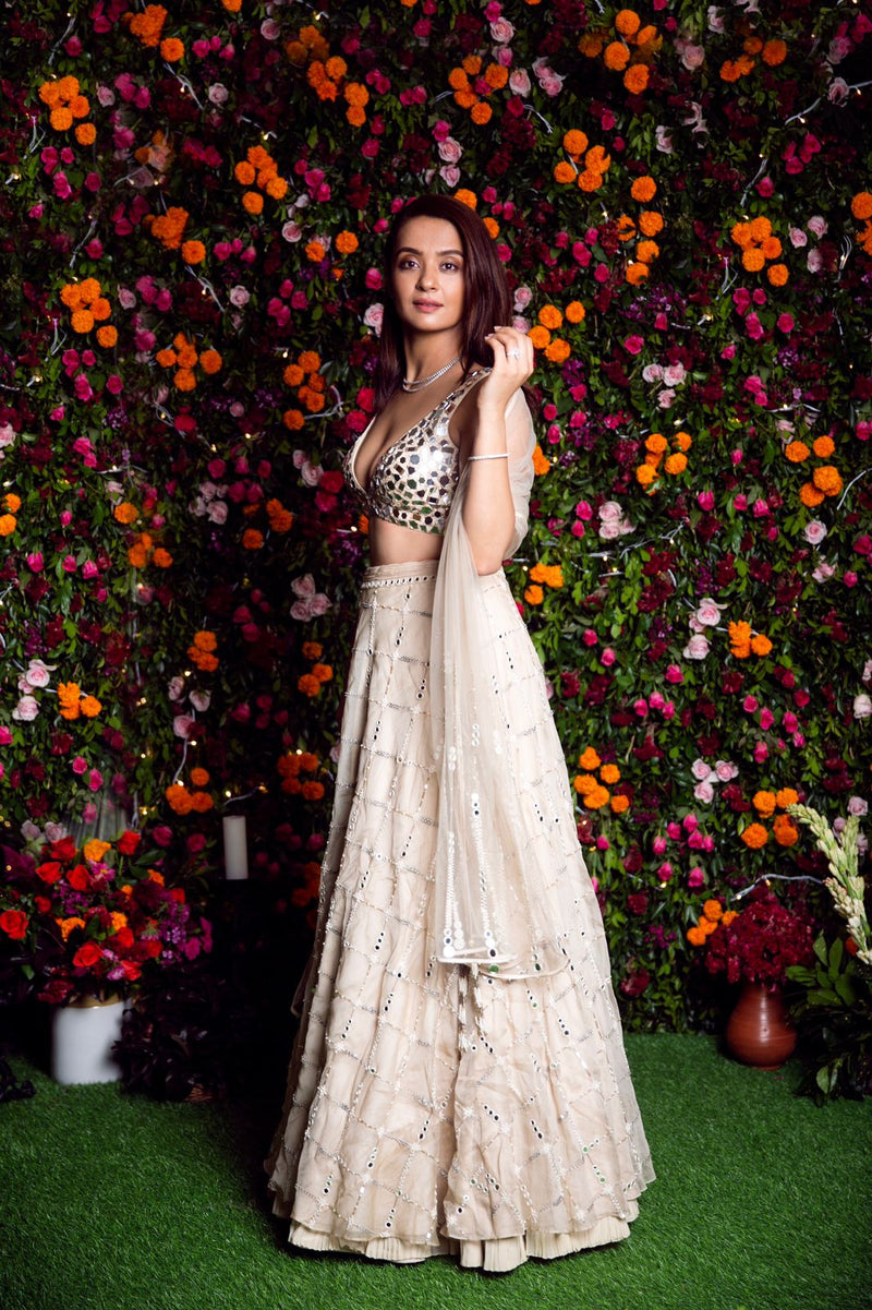 Surveen Chawla in our ivory mirror lehenga with mirror blouse.